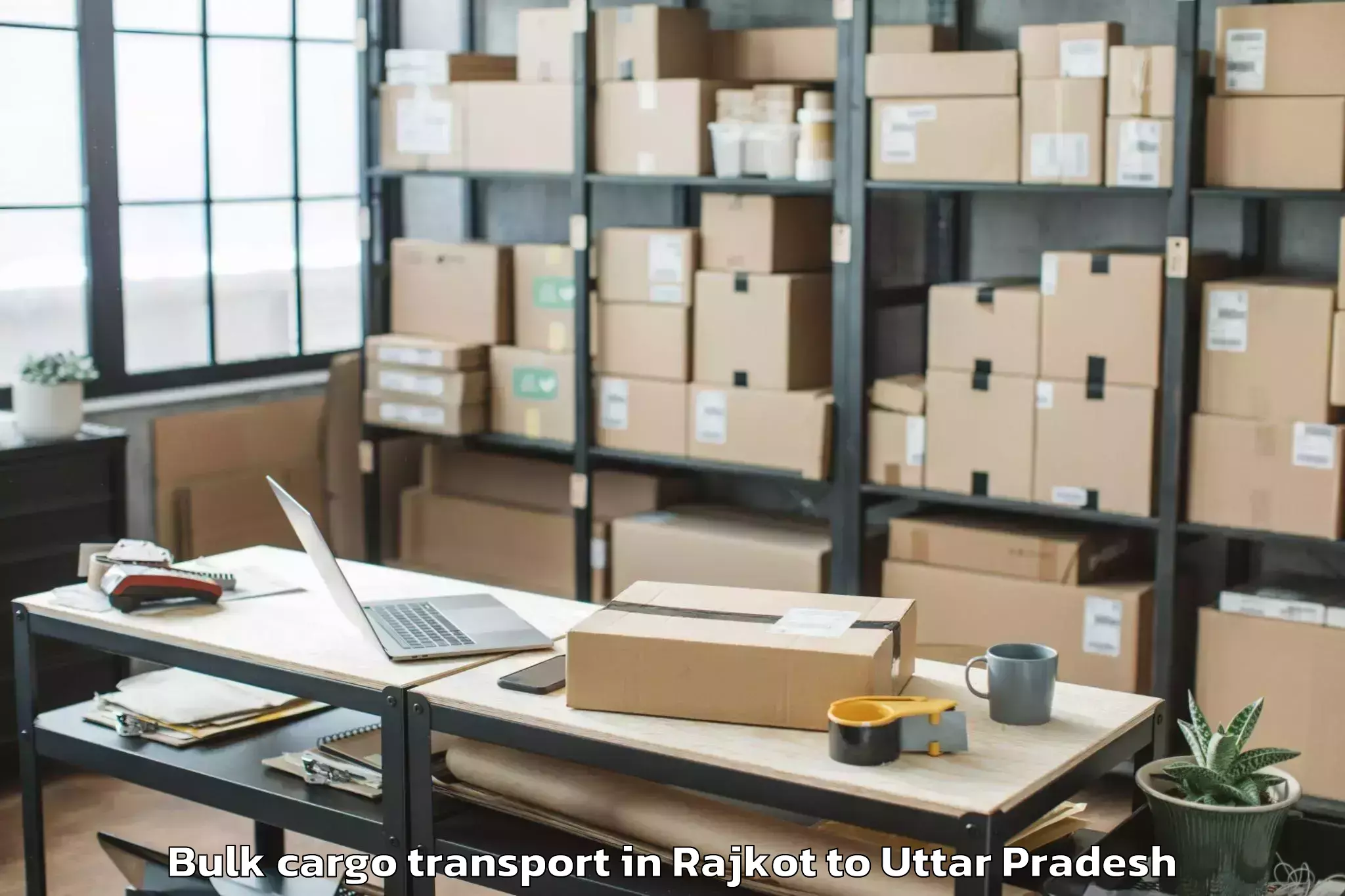 Reliable Rajkot to Manjhanpur Bulk Cargo Transport